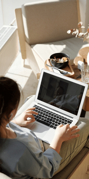 woman with laptop - digital declutter